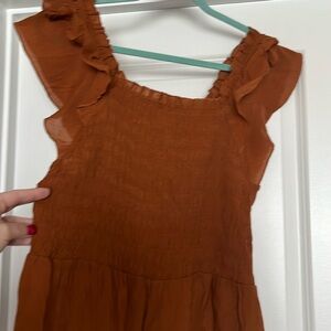 Smocked top w/ flutter sleeves